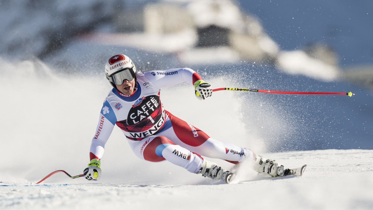 Swiss Beat Feuz icompetes during the men&#039;s downhill race at the Alpine Skiing World Cup in Wengen, Switzerland, Saturday, Jan. 13, 2018. (Jean-Christophe Bott/Keystone via AP)
