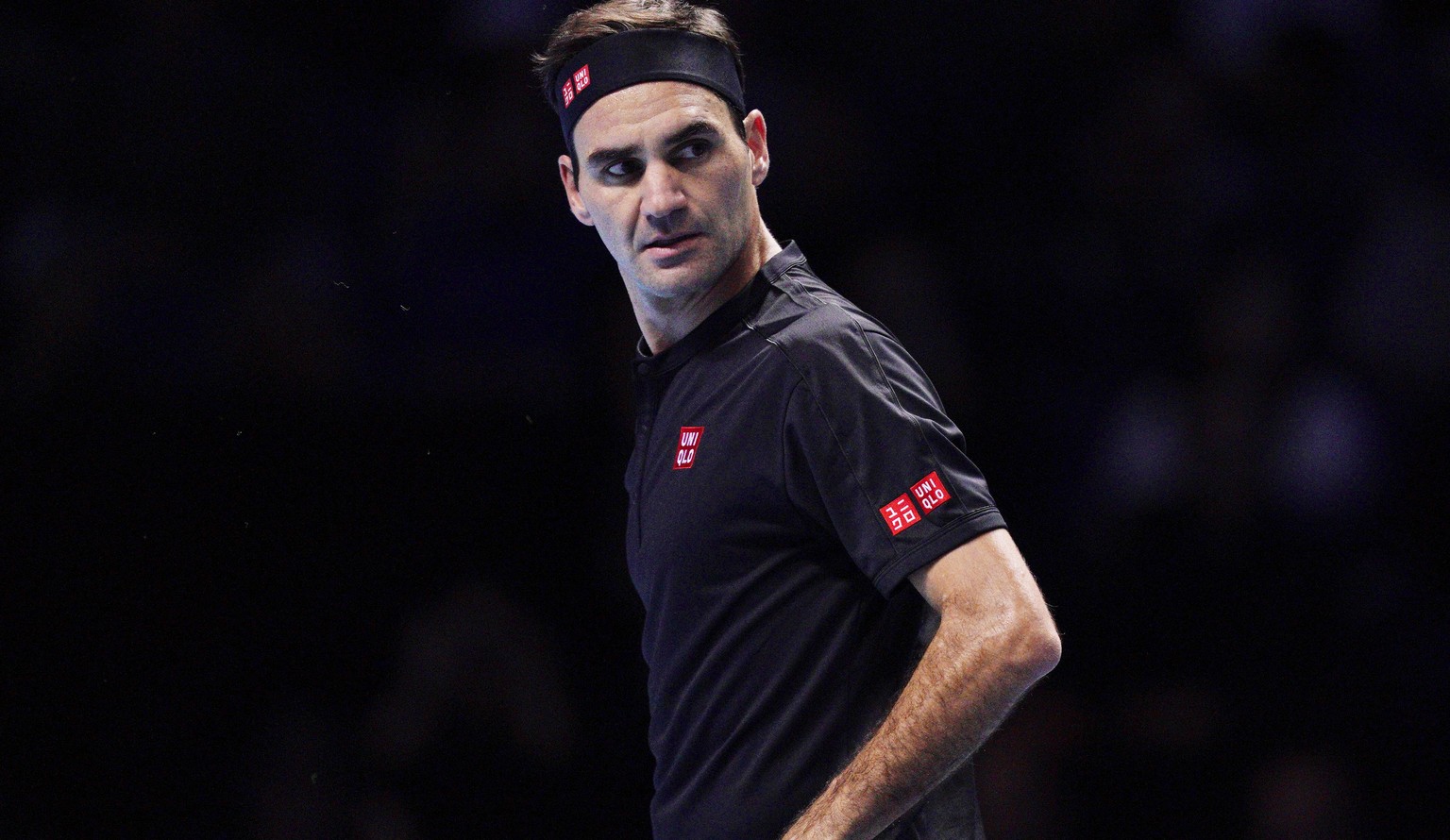 epa07987029 Roger Federer of Switzerland reacts during his round robin match against Dominic Thiem of Austria at the ATP World Tour Finals tennis tournament in London, Britain, 10 November 2019. EPA/W ...
