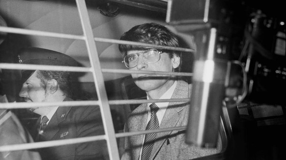 British serial killer Dennis Nilsen (1945 - 2018) escorted in a police van, UK, 5th November 1983. (Photo by Harry Dempster/Daily Express/Hulton Archive/Getty Images)
