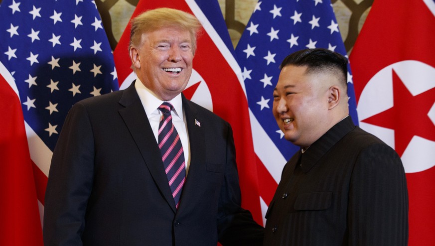FILE - In this Feb. 27, 2019 file photo, President Donald Trump, left, meets North Korean leader Kim Jong Un, in Hanoi. President Trump met North Korean leader Kim on the heavily fortified border betw ...
