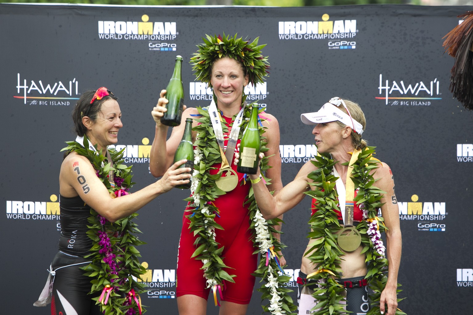 IMAGE DISTRIBUTED FOR IRONMAN - (L-R) Rachel Joyce, of England, Daniela Ryf, of Switzerland, and Liz Blatchford, of Australia, celebrate after finishing top three in the women&#039;s 2015 IRONMAN Worl ...