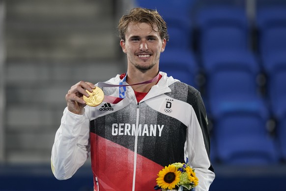 Alexander Zverev, of Germany, poses with the gold medal in the men&#039;s single of the tennis competition at the 2020 Summer Olympics, Sunday, Aug. 1, 2021, in Tokyo, Japan. (AP Photo/Patrick Semansk ...