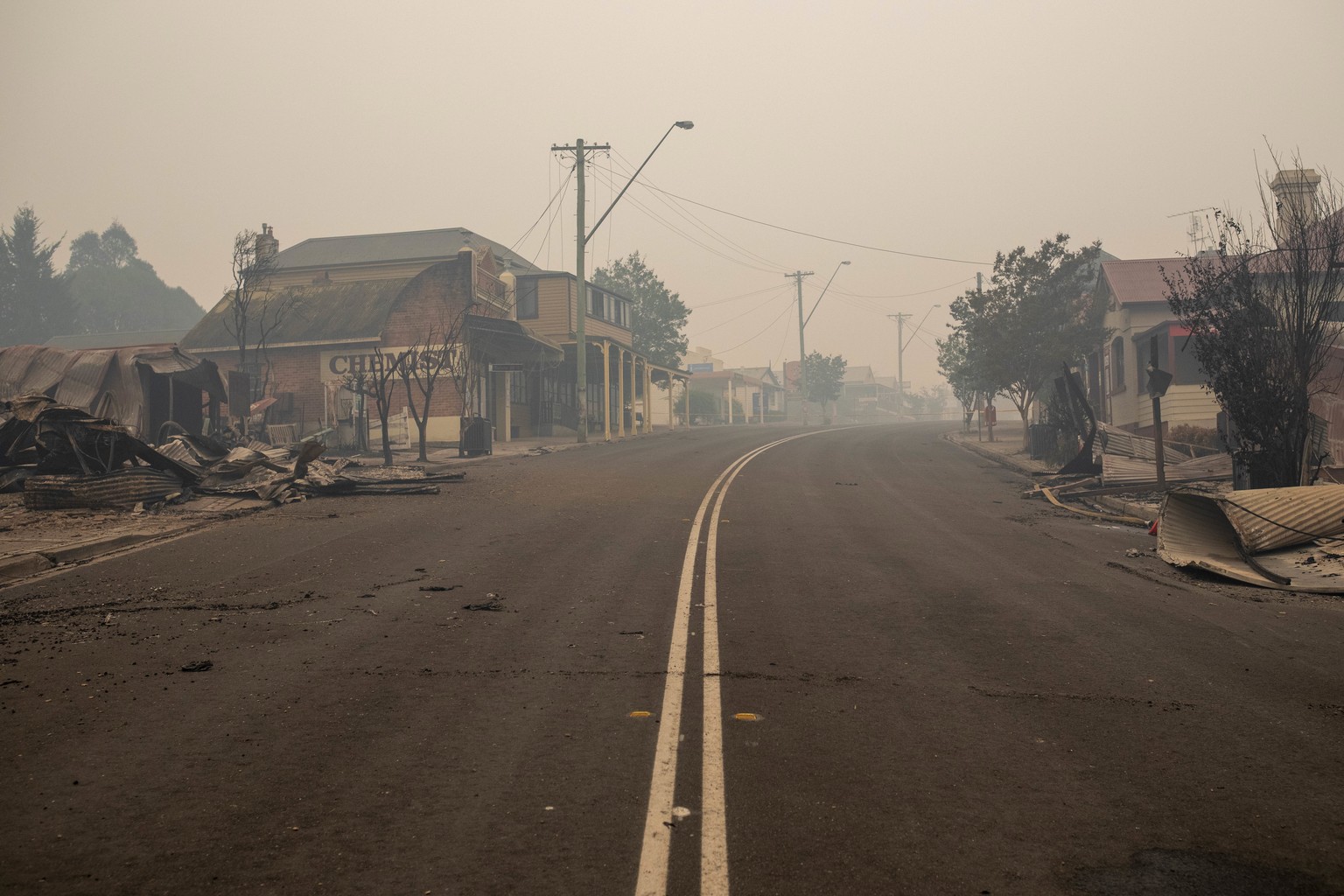 epa08096849 The rubble of buildings sits on the ground after they were destroyed by fire in Cobargo, New South Wales, Australia, 01 January 2020. EPA/SEAN DAVEY NO ARCHIVING AUSTRALIA AND NEW ZEALAND  ...