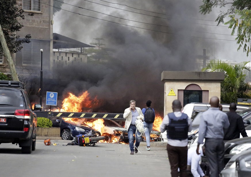 Fire and smoke rise from the scene of an explosion in Nairobi, Kenya Tuesday, Jan. 15, 2019.An upscale hotel complex in Kenya&#039;s capital came under attack on Tuesday, with a blast and heavy gunfir ...