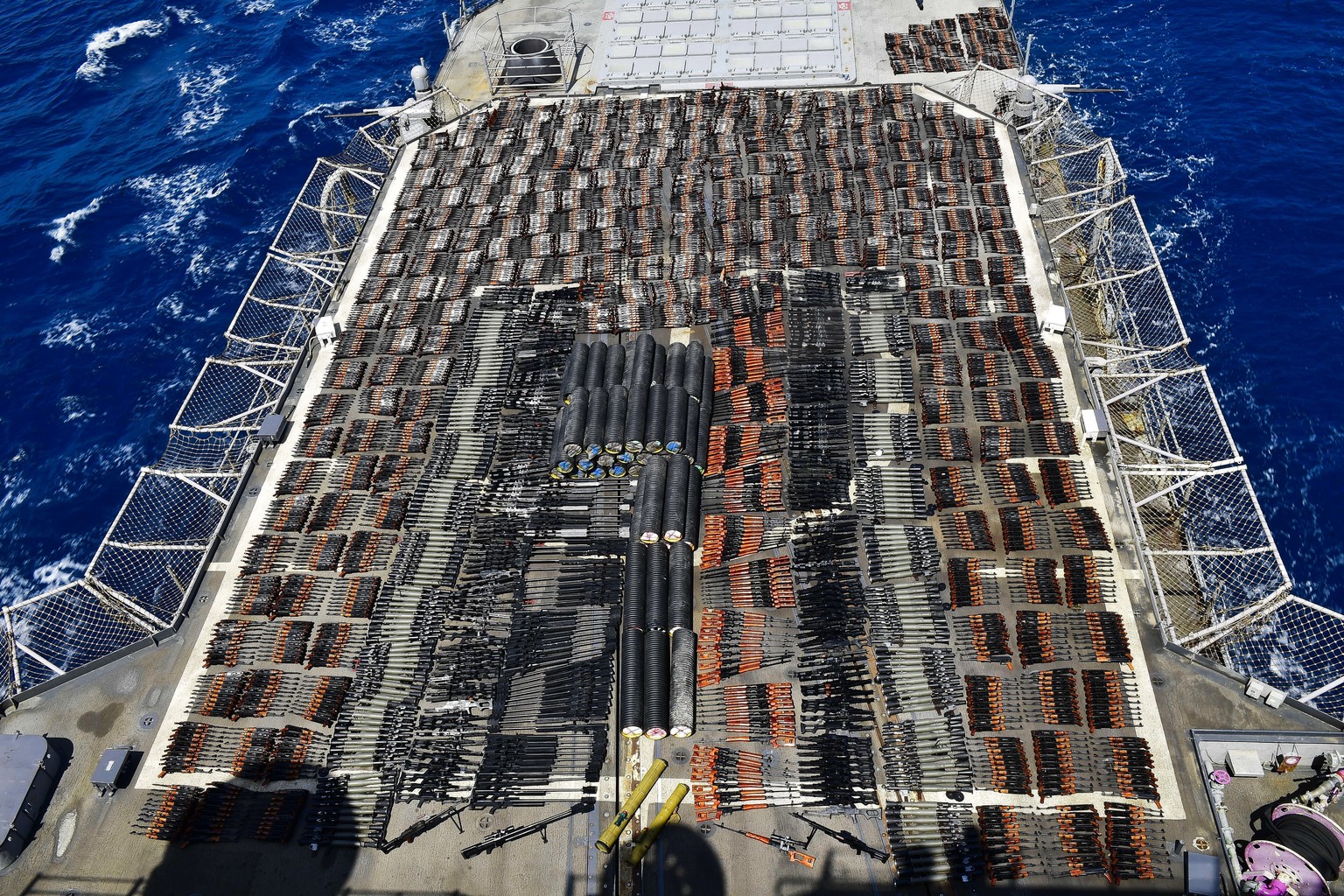 Weapons that the U.S. Navy described as coming from a hidden arms shipment aboard a stateless dhow are seen aboard the guided-missile cruiser USS Monterey on Saturday, May 8, 2021. The U.S. Navy annou ...