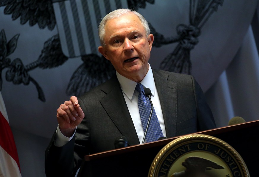 epa05933247 US Attorney General Jeff Sessions speaks at the federal courthouse in Central Islip, New York, USA, 28 April 2017. His speech was focused on gang violence and prosecution for illegal immig ...