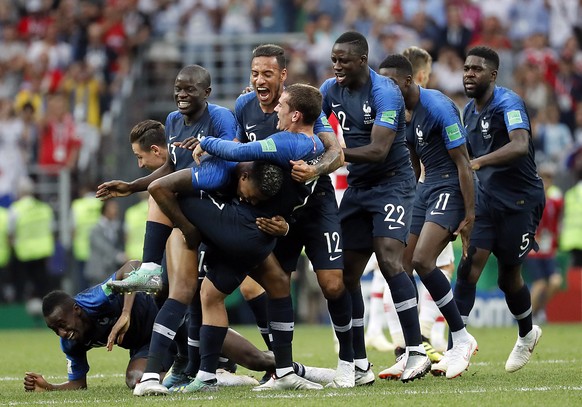 epa06891221 Players of France celebrate after the FIFA World Cup 2018 final between France and Croatia in Moscow, Russia, 15 July 2018.

(RESTRICTIONS APPLY: Editorial Use Only, not used in associat ...
