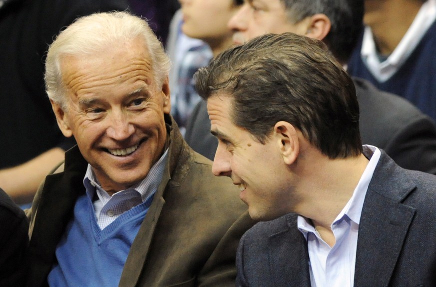 epa07872755 (FILE) - Then US Vice President Joe Biden (L) and his son Hunter Biden attend a college basketball game, at the Verizon Center in Washington, DC, USA, 30 January 2010 (reissued 27 Septembe ...