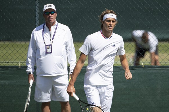 epa07677547 Alexander Zverev of Germany and his coach Ivan Lendl, during a training session at the All England Lawn Tennis Championships in Wimbledon, London, on Thursday, June 27, 2019. EPA/PETER KLA ...