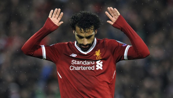 Liverpool&#039;s Mohamed Salah celebrates after scoring his side&#039;s second goal during the Champions League semifinal, first leg, soccer match between Liverpool and Roma at Anfield Stadium, Liverp ...