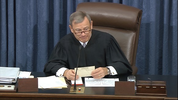 In this image from video, presiding officer Chief Justice of the United States John Roberts reads a question during the impeachment trial against President Donald Trump in the Senate at the U.S. Capit ...