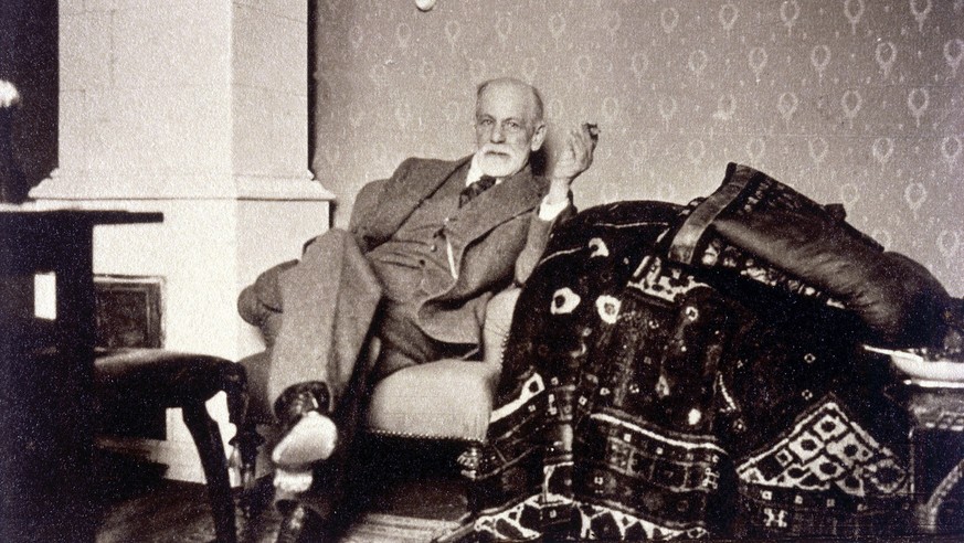 In this photo released by the Sigmund Freud Museum in Vienna former Austrian psychoanalyst Sigmund Freud sits next to his famous couch around 1932. Austria and the world will be celebrating Sigmund Fr ...