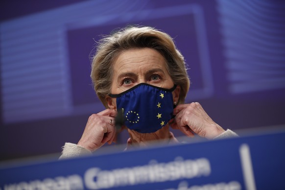FILE - In this Thursday, Dec. 24, 2020 file photo, European Commission President Ursula von der Leyen prepares to address a media conference on Brexit negotiations at EU headquarters in Brussels. Elev ...