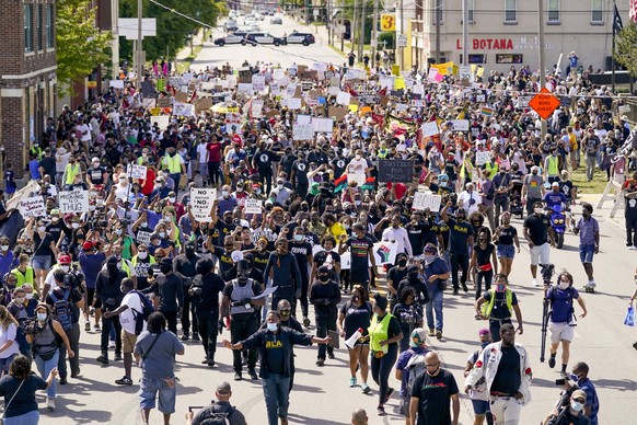Hundreds march at a rally for Jacob Blake Saturday, Aug. 29, 2020, in Kenosha, Wis. (AP Photo/Morry Gash)
