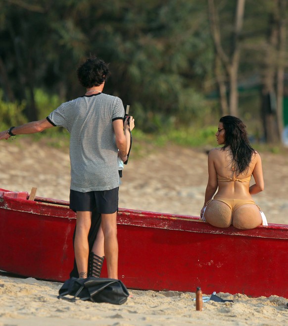 EXCLUSIVE: ***PREMIUM EXCLUSIVE. NO WEB***Kim Kardashian shows off her famous booty in a nude-coloured bikini on a photo shoot in Thailand. Pix taken March 31.
&lt;P&gt;
Pictured: Kim Kardashian
&l ...