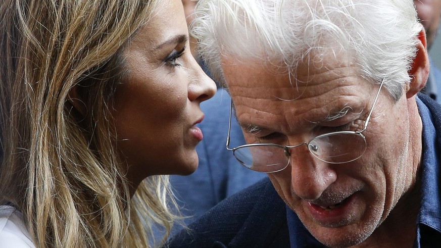 epa05553525 US actor Richard Gere (R) and his Spanish girlfriend Alejandra Silva (L) visit a center for homeless people in San Sebastian, Spain, 23 September 2016. Gere is in the country to attend the ...