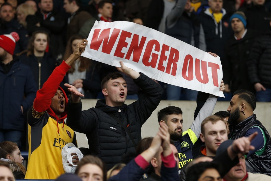 Britain Football Soccer - West Bromwich Albion v Arsenal - Premier League - The Hawthorns - 18/3/17 Arsenal fans hold up banners directed at manager Arsene Wenger at the end of the match Action Images ...