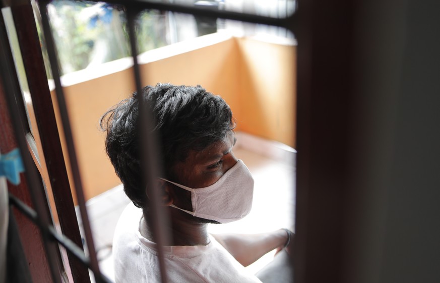 Sri Lankan auto rickshaw driver Prasad Dinesh, linked by Sri Lankan officials to nearly half the country&#039;s more than 2,600 coronavirus cases, sits in his house in Ja-Ela, Sri Lanka, Wednesday, Ju ...