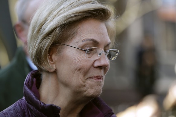 Sen. Elizabeth Warren, D-Mass., speaks to the media outside her home, Thursday, March 5, 2020, in Cambridge, Mass., after she dropped out of the Democratic presidential race. (AP Photo/Steven Senne)
E ...