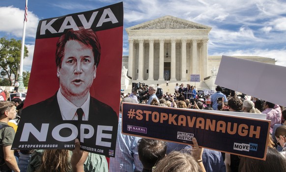 Protesters rally against Supreme Court nominee Brett Kavanaugh as the Senate Judiciary Committee debates his confirmation, Friday, Sept. 28, 2018, at the Supreme Court in Washington. (AP Photo/J. Scot ...