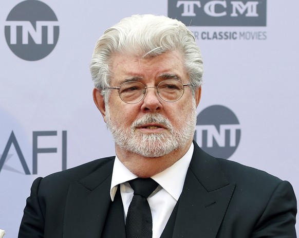 FILe - In this June 9, 2016 file photo, filmmaker George Lucas appears at the 2016 AFI Life Achievement Award Gala Tribute to John Williams in Los Angeles.Lucas has given another $10 million to the Un ...