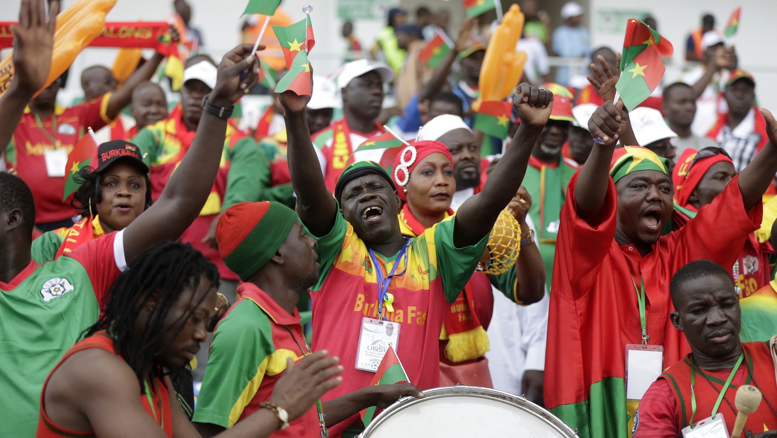 Burkina Faso soccer team fans chant ahead of the African Cup of Nations Group A soccer match between Gabon and Burkina Faso at the Stade de l&#039;Amitie, in Libreville, Gabon on Wednesday Jan. 18, 20 ...