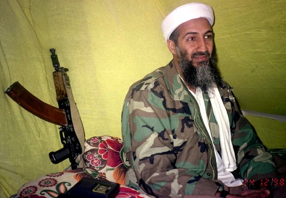 FILE - In this Dec. 24, 1998, file photo, al-Qaida leader Osama Bin Laden speaks to a selected group of reporters in mountains of Helmand province in southern Afghanistan. Years after the death of his ...
