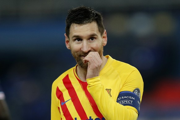 Barcelona&#039;s Lionel Messi reacts after a missed a penalty shot during the Champions League, round of 16, second leg soccer match between Paris Saint-Germain and FC Barcelona at the Parc des Prince ...