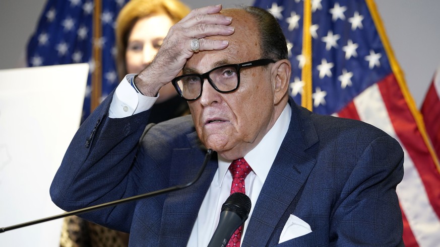 FILE - In this Nov. 19, 2020, file photo, former New York Mayor Rudy Giuliani, who was a lawyer for President Donald Trump, speaks during a news conference at the Republican National Committee headqua ...