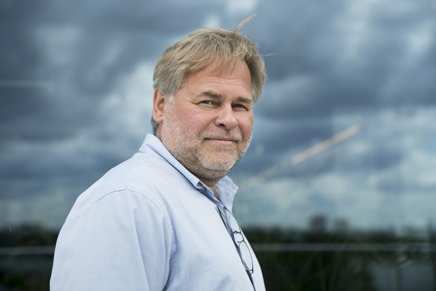 FILE - In this July 1, 2017, file photo, Eugene Kaspersky, Russian antivirus programs developer and chief executive of Russia&#039;s Kaspersky Lab, poses for a photo on a balcony at his company&#039;s ...