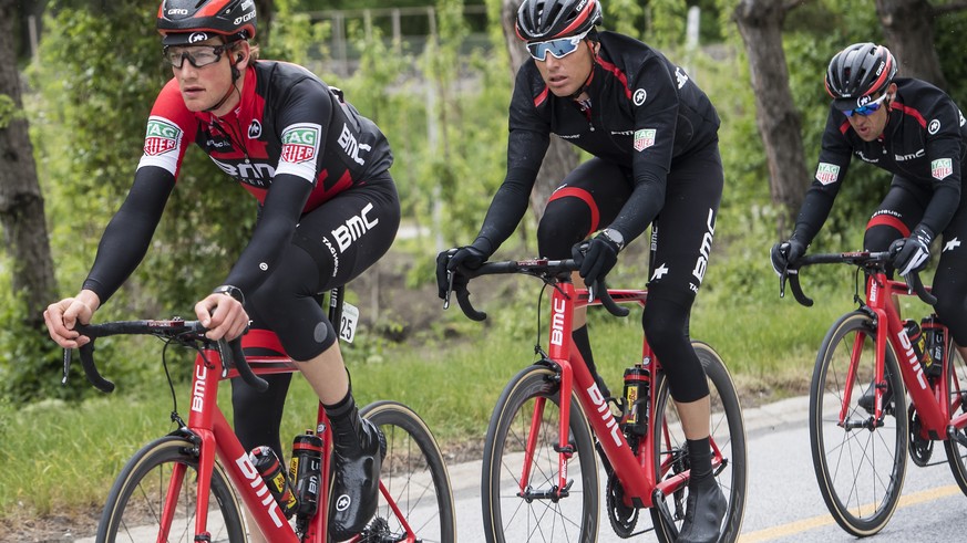 from left to right, Stefan Kueng from Switzerland of team BMC Racing, Michael Schar from Switzerland of team BMC Racing, and Richie Porte from Australia of team BMC Racing, in action the first stage,  ...