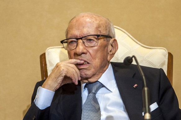FILE - In this photo taken on Oct.3, 2018 Tunisian President Beji Caid Essebsi is pictured during a joint press conference with his Djibouti counterpart at the presidential palace in Carthage, near th ...
