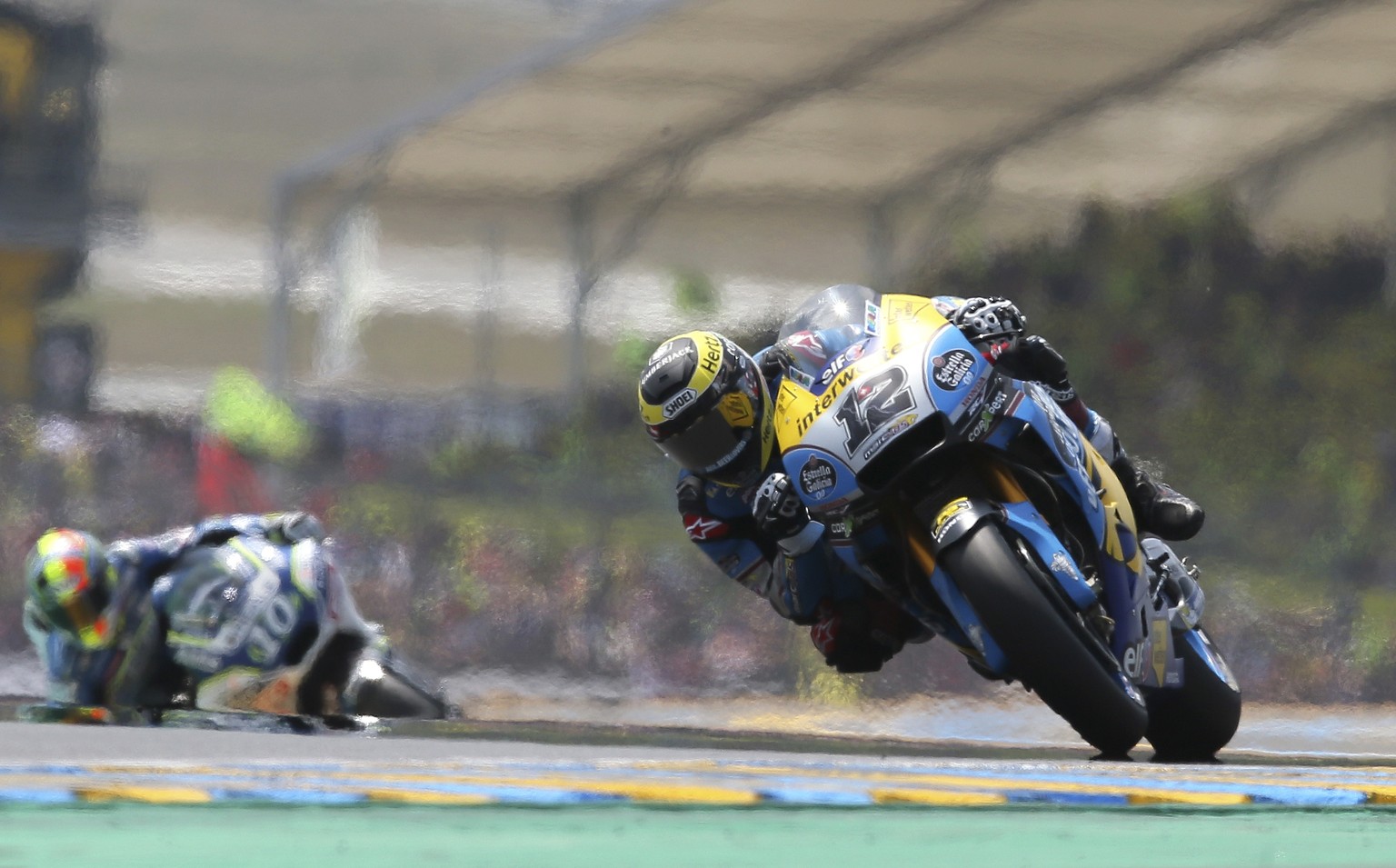 Moto GP rider Thomas Luthi of Switzerland takes a curve during the French Motorcycle Grand Prix race in Le Mans, France, Sunday, May 20, 2018. (AP Photo/David Vincent)