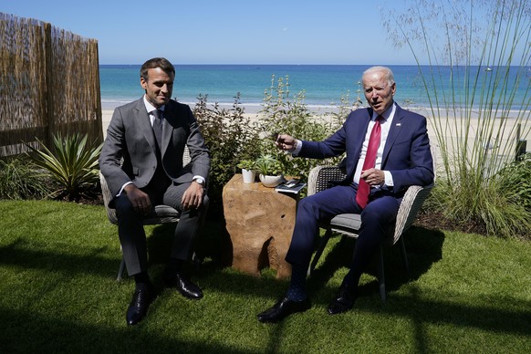 President Joe Biden and French President Emmanuel Macron visit during a bilateral meeting at the G-7 summit, Saturday, June 12, 2021, in Carbis Bay, England. (AP Photo/Patrick Semansky)
Joe Biden,Emma ...