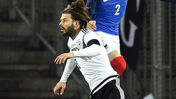 Germany&#039;s Marvin Plattenhardt, left, and France&#039;s Christophe Jallet, right, go for a header during an international friendly soccer match between Germany and France in Cologne, Germany, Tues ...