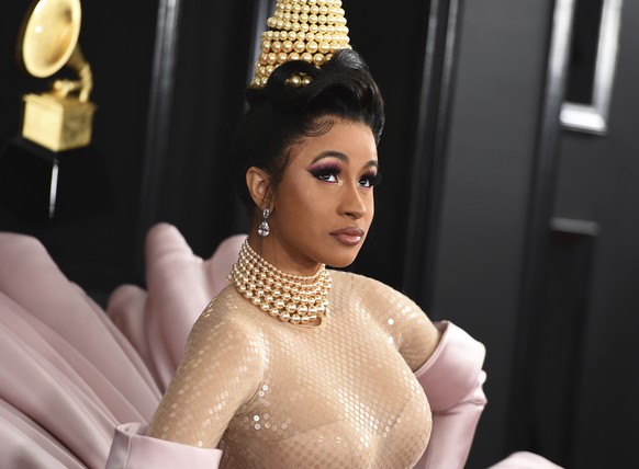 FILE - This Feb. 10, 2019 file photo shows Cardi B at the 61st annual Grammy Awards in Los Angeles. The rapper has come under fire this week for what she says is a three-year-old video in which she cl ...
