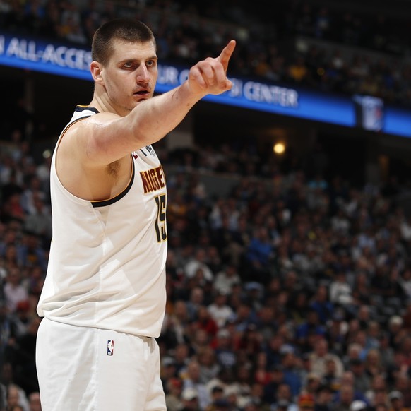 Denver Nuggets center Nikola Jokic points to a referee after Jokic was called for a foul during the second half of Game 5 of the team&#039;s NBA basketball second-round playoff series against the Port ...