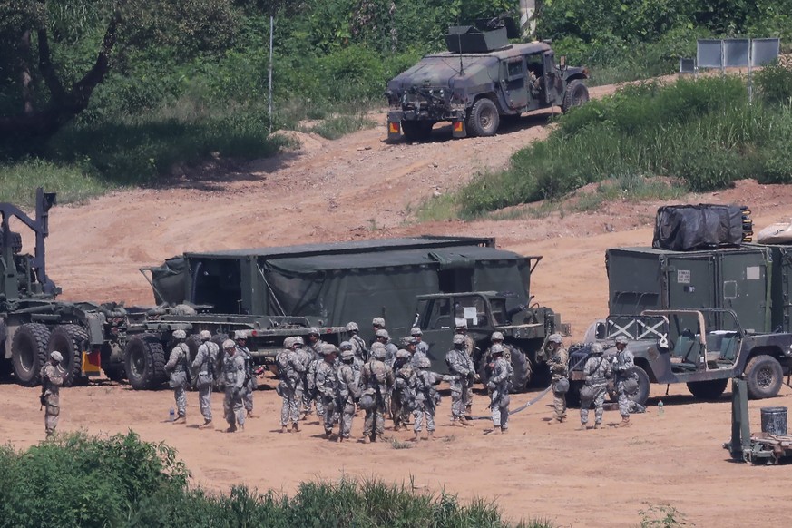 epa05506570 American soldiers and vehicles prepare to participate in the Ulchi Freedom Guardian (UFG) joint military exercise near the inter-Korean border in Paju, north of Seoul, South Korea, 22 Augu ...