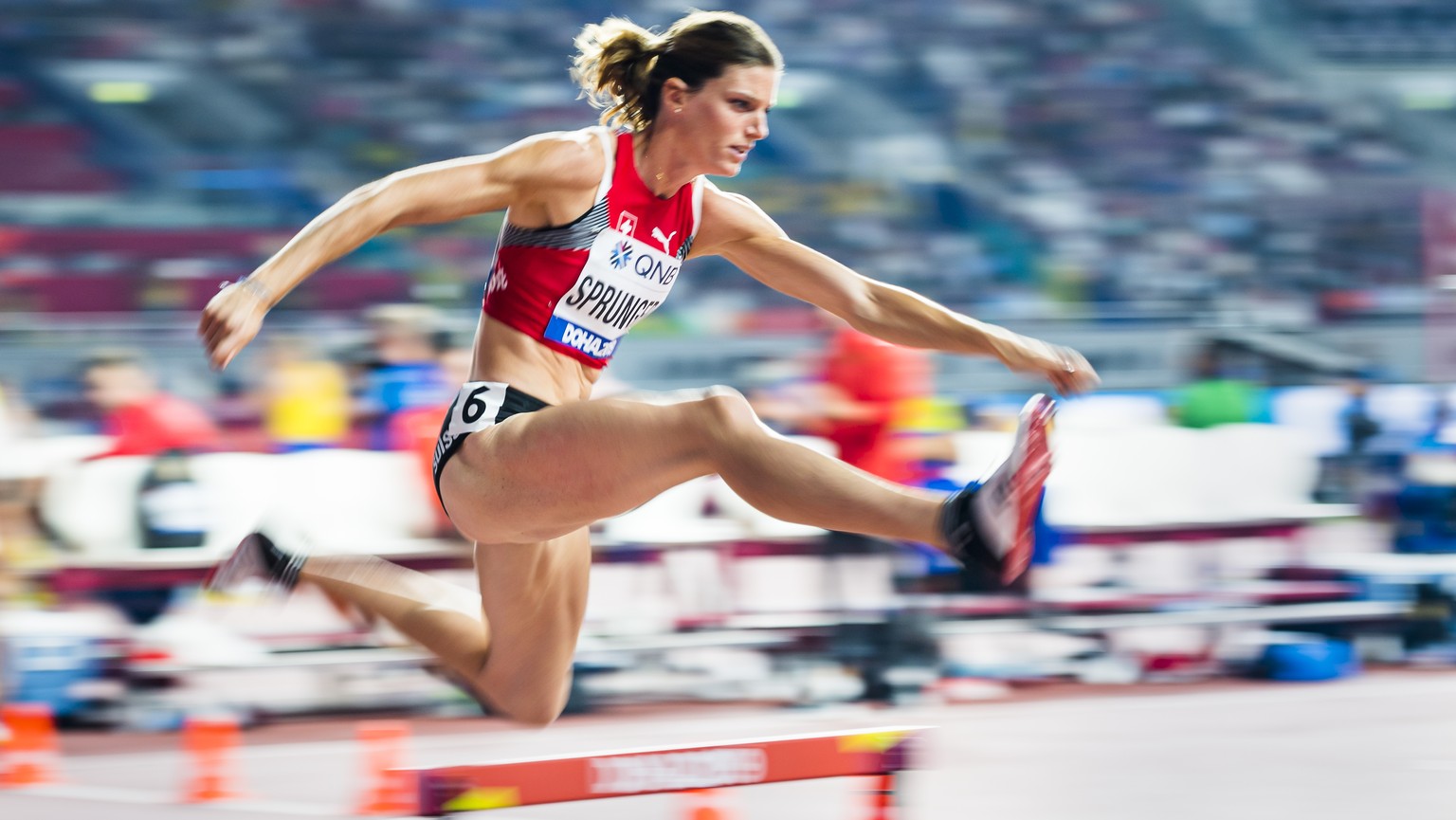 Lea Sprunger from Switzerland in action during the women&#039;s 400 meters hurdles semi-final at the IAAF World Athletics Championships, at the Khalifa International Stadium, in Doha, Qatar, Wednesday ...
