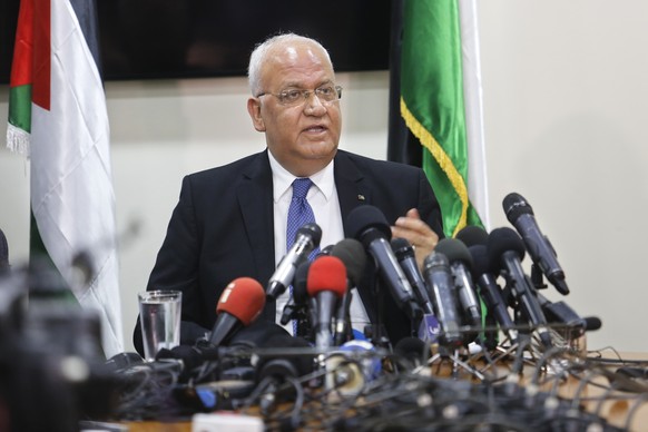 Palestinian Saeb Erekat, a veteran peace negotiator, speaks during a press conference in the West Bank city of Ramallah, Wednesday, July 4, 2018. Erekat lashed out at President Donald Trump, saying &q ...