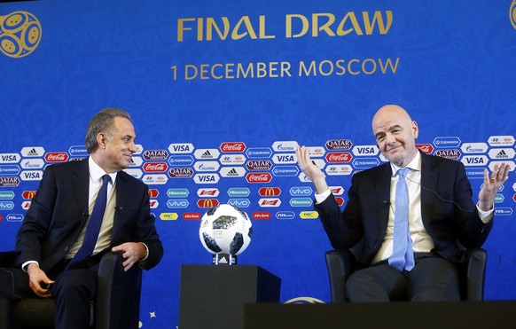 epa06360986 Russia&#039;s deputy prime minister Vitaly Mutko (L) and FIFA President Gianni Infantino (R) attend a press conference before the Final Draw of the FIFA World Cup 2018 at the State Kremlin ...