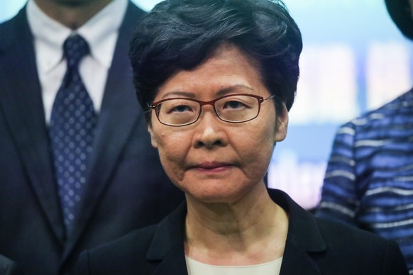 epa07894453 Hong Kong&#039;s Chief Executive Carrie Lam speaks during a press conference announcing a ban on face masks in public, in Hong Kong, China, 04 October 2019. Carrie Lam said that her govern ...