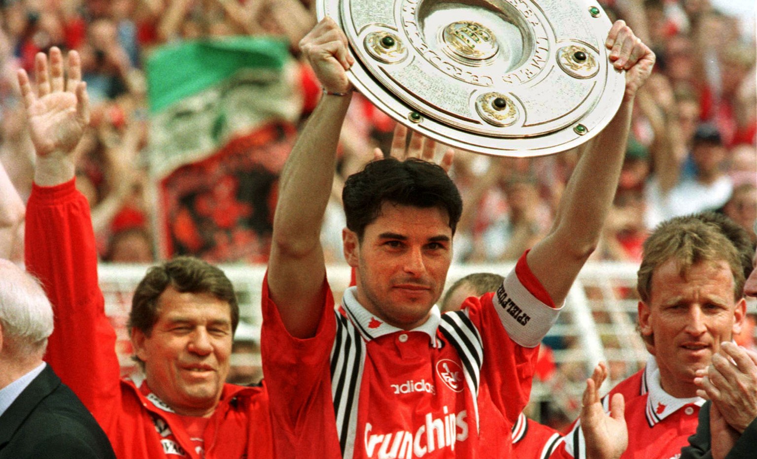 Team captain of German soccer champion Kaiserslautern, Ciriaco Sforza, displays the trophy in Hamburg&#039;s Volkspark Stadium on Saturday May 9, 1998, prior to the season&#039;s last match Hamburg vs ...