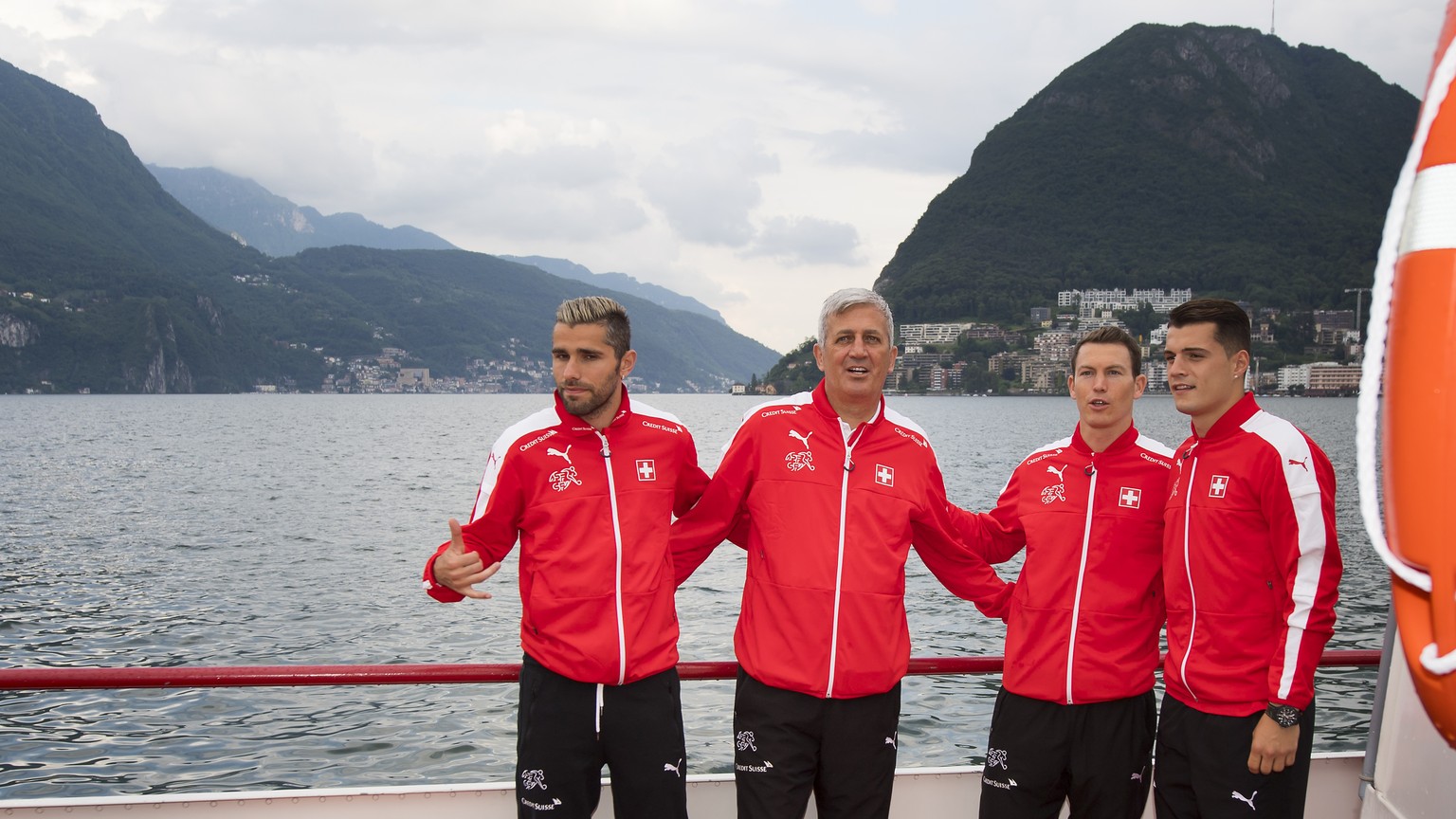 Swiss soccer player Valon Behrami, Swiss national soccer head coach Vladimir Petkovic, and Swiss soccer players Stephan Lichtsteiner and Granit Xhaka, from left to right, pose during a team&#039;s boa ...