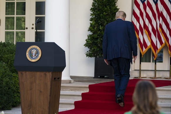 President Donald Trump walks off after speaking during a news conference in the Rose Garden of the White House, Tuesday, July 14, 2020, in Washington. (AP Photo/Evan Vucci)
Donald Trump