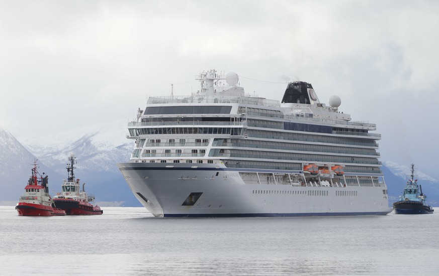 The cruise ship Viking Sky arrives at port off Molde, Norway, Sunday March 24, 2019, after the problems in heavy seas off Norway&#039;s western coast. Rescue helicopters took more than 475 passengers  ...