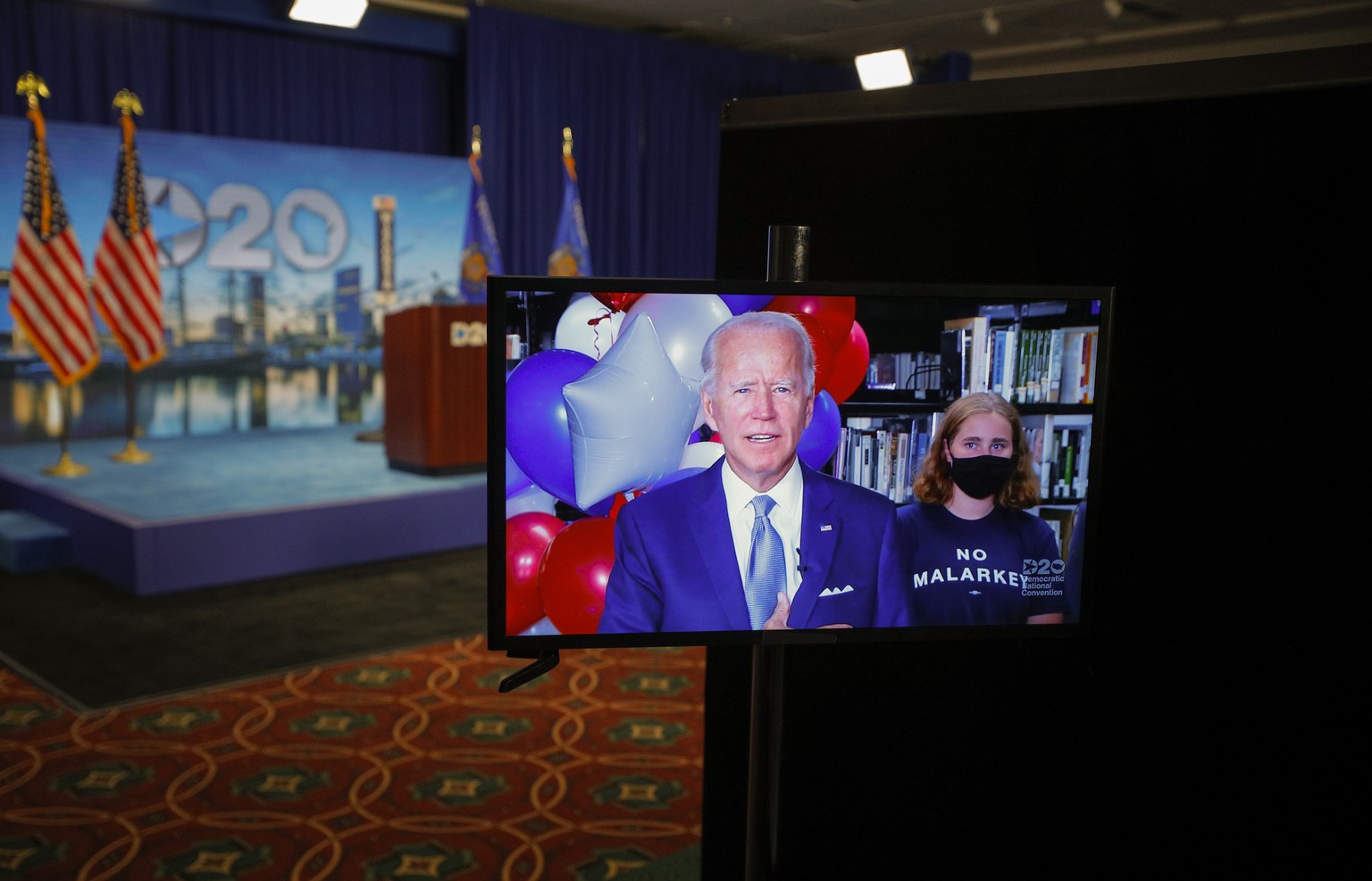 Democratic 2020 presidential nominee and former Vice President Joe Biden reacts in a video feed from Delaware after winning the votes to become the Democratic Party&#039;s 2020 nominee for President d ...