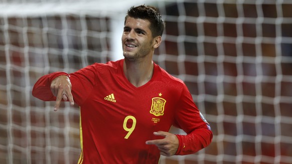 Spain&#039;s Alvaro Morata celebrates scoring his side&#039;s 3rd goal during the World Cup Group G qualifying soccer match between Spain and Italy at the Santiago Bernabeu stadium in Madrid, Spain, S ...