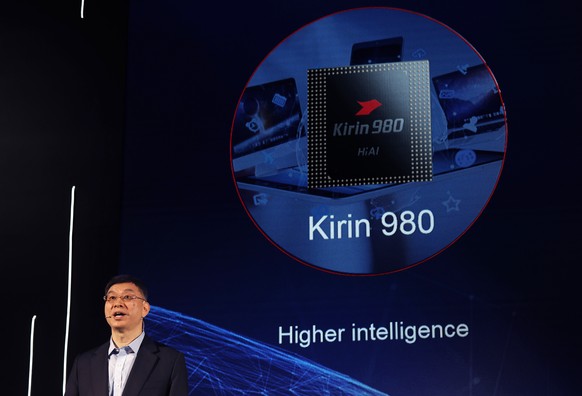 William Xu, director, chief strategy marketing officer, chairman of the Investment Review Board of Huawei, speaks during an unveiling ceremony for a processor chip in Shenzhen, China, Monday, Jan. 7,  ...