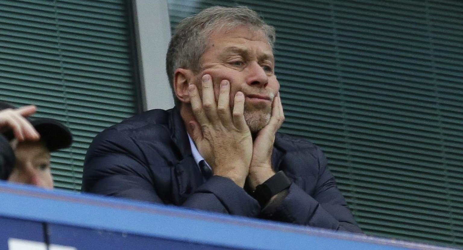 FILE - In this file photo dated Saturday, Dec. 19, 2015, Chelsea soccer club owner Roman Abramovich sits in his box before the English Premier League soccer match between Chelsea and Sunderland at Sta ...